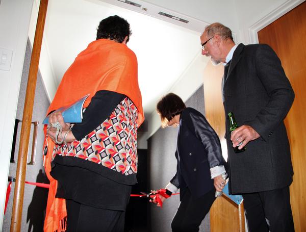 Mayor Wayne Brown's wife Toni officially opens the cinema while Mr Brown and Kaitaia health worker Lisa McNabb look on.